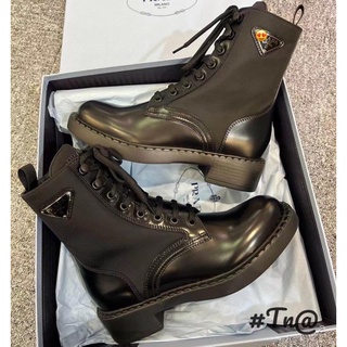 Boot da prada đan dây mai phương bùi