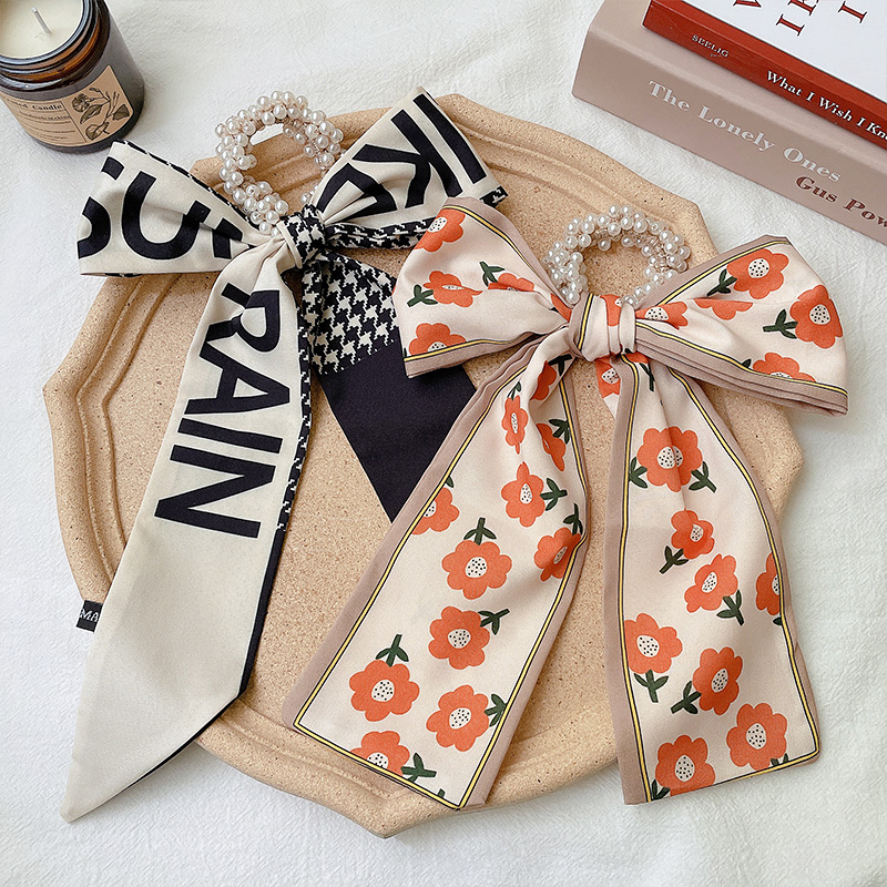 Dây buộc tóc scrunchies thắt nơ phối ngọc trai cho nữ