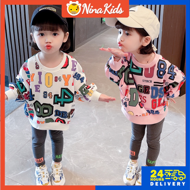 Áo thun Nina Kids tay dài in chữ cái xinh xắn dành cho bé gái 1-8 tuổi