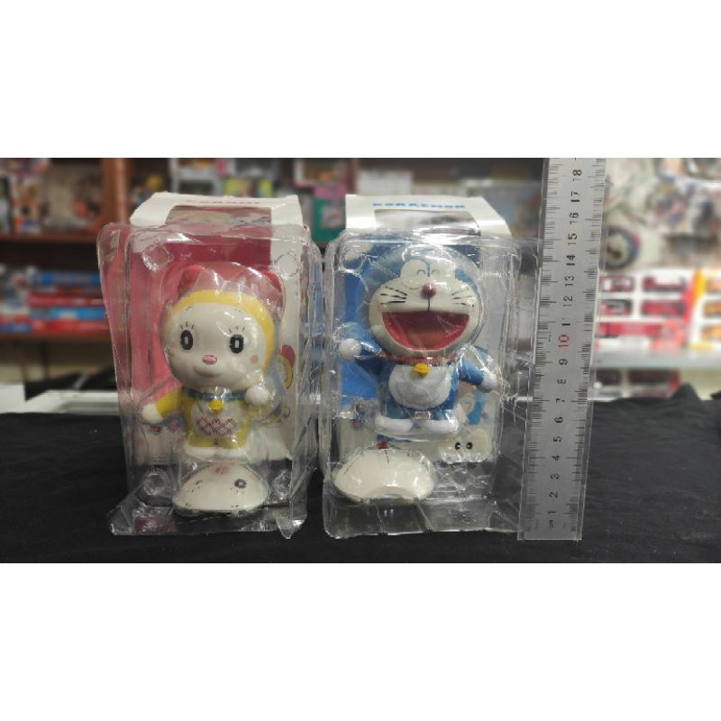 Mô hình Doreamon và Doremi thay đổi khuôn mặt.