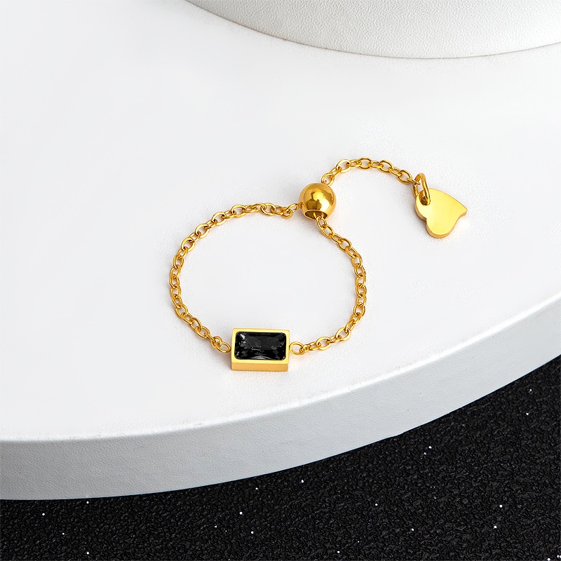 Nhẫn ThéP Titan Mạ VàNg 18k ĐíNh Đá NgọC LụC BảO