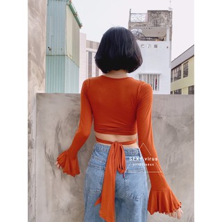 Crop tay dài loe cột bụng