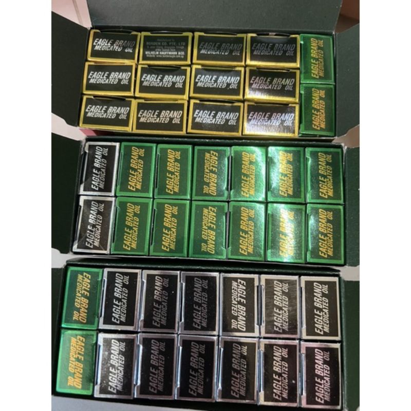 Dầu gió xanh, trắng, vàng con ó Eagle Brand dạng lăn