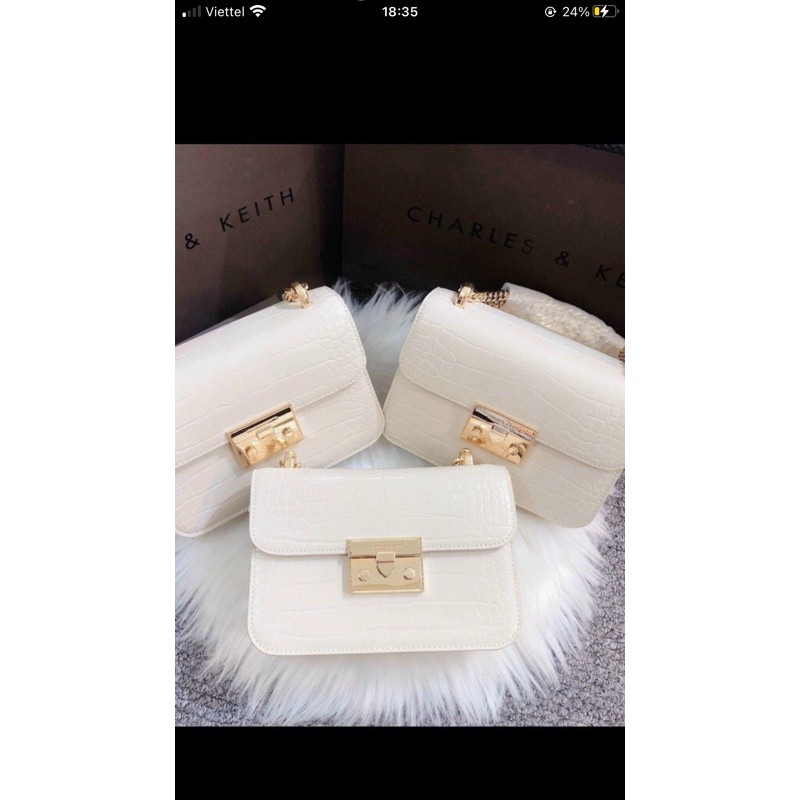 Túi ck khoá miu vân rắn