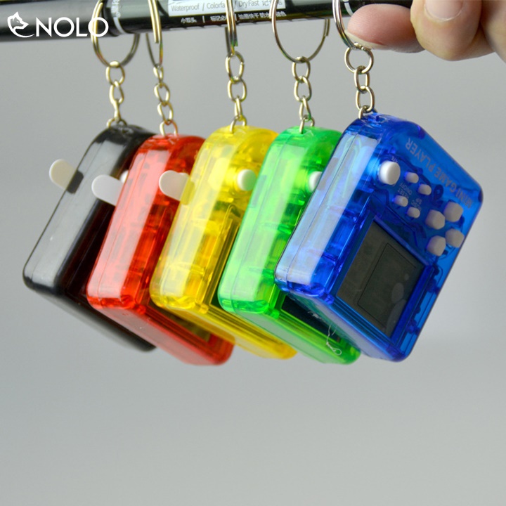 Móc Treo Chìa Khóa Máy Chơi Game Console Mini PM101 Gồm 23 Trò Dùng Nguồn Pin Cúc Áo