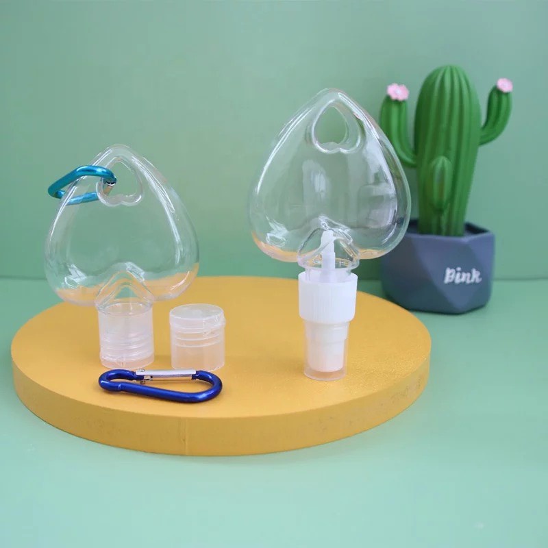 Chai 50ml Trong Suốt Hình Trái Tim Kèm Móc Treo Dùng Chiết Nước Rửa Tay Mang Theo