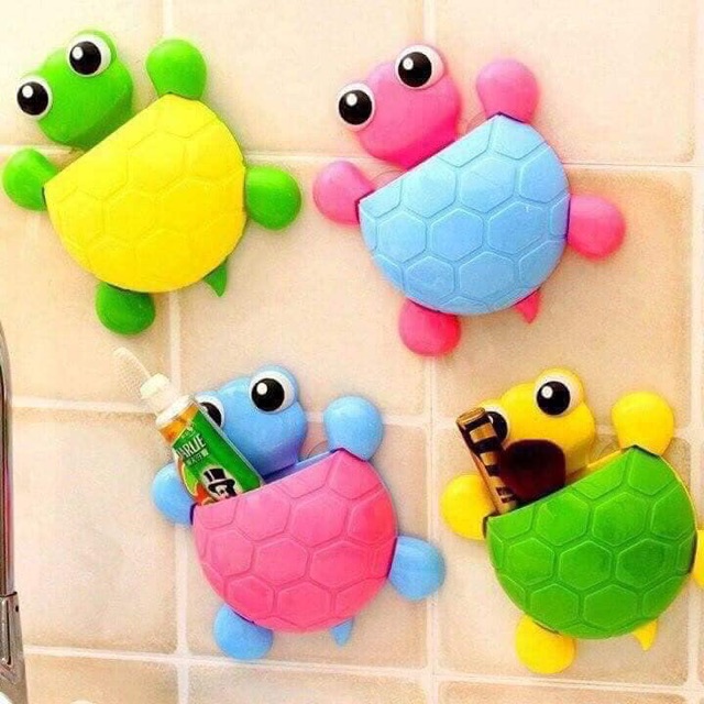 BỌ RÙA VÀ RÙA ĐỰNG BÀN CHẢI VÀ KEM ĐÁNH RĂNG .