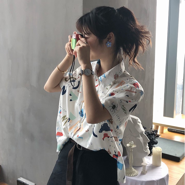 LEEVA - Áo sơ mi in chữ họa tiết thời trang Hàn Quốc: Trắng chữ
