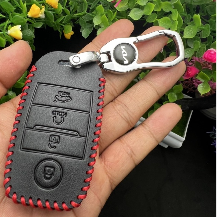 Bao Da chì khóa 4 nút Smartkey Xe ô tô Kia Seltos, Kia Sonet đời mới nhất.