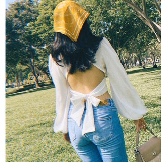 Áo croptop trắng tay bồng cúp ngực nơ lưng