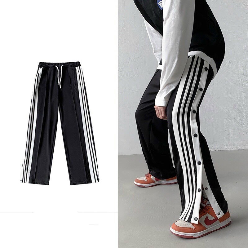 QUẦN SUÔNG UNISEX NAM NỮ XẺ TÀ PHỐI 16 NÚT ỐNG RỘNG SUÔNG CỰC HOT