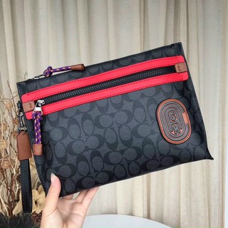 Clutch Coach mới cho nam kèm móc tay tiện cầm