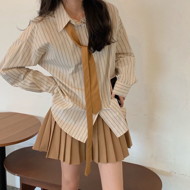 Set áo sơ dài tay họa tiết kẻ sọc + chân váy tennis phong cách Hàn Quốc trẻ trung cho nữ