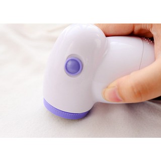 Máy cắt lông xù quần áo