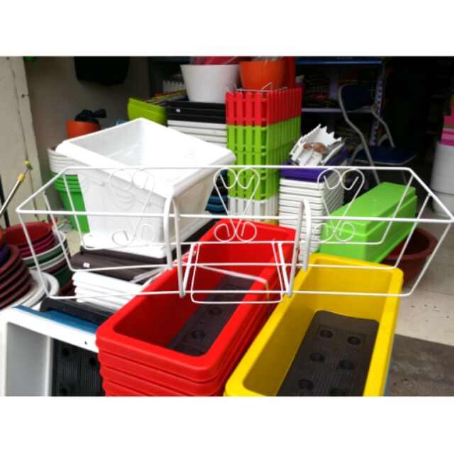 Giá sắt ban công tim to dùng để chậu dài 67cm x 23cm  x cao19cm
