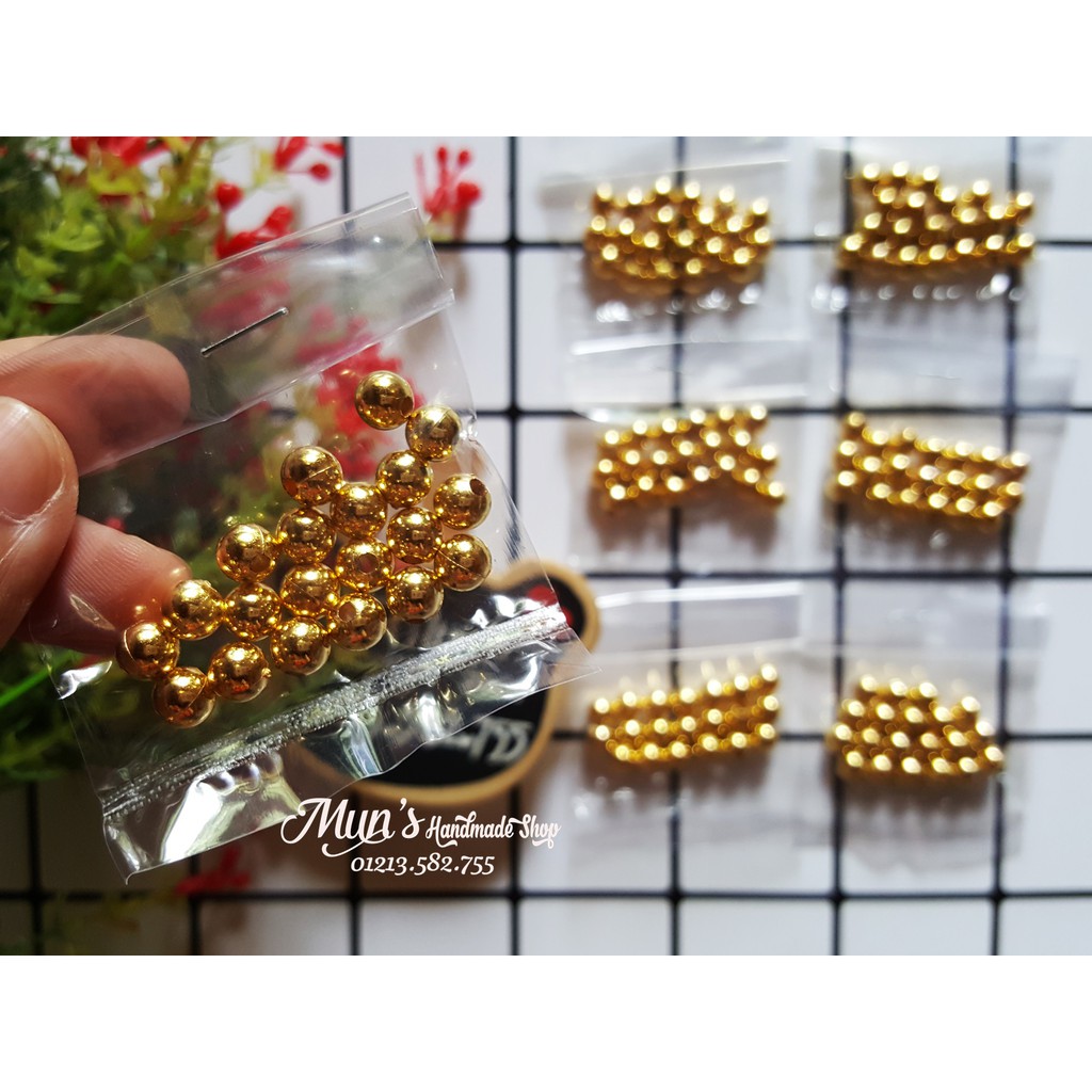 Hạt bi tròn 8mm vàng óng (túi 10-30g)