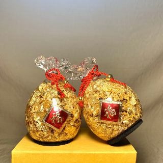 Hũ tiền vàng lá để ban Thần Tài