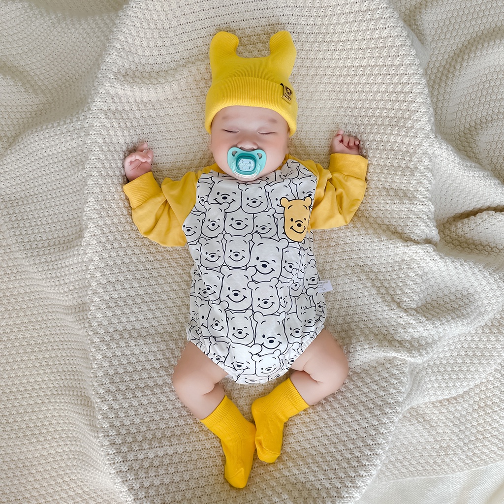 Bộ áo liền quần tay dài in hình gấu pooh dễ thương dành cho bé sơ sinh