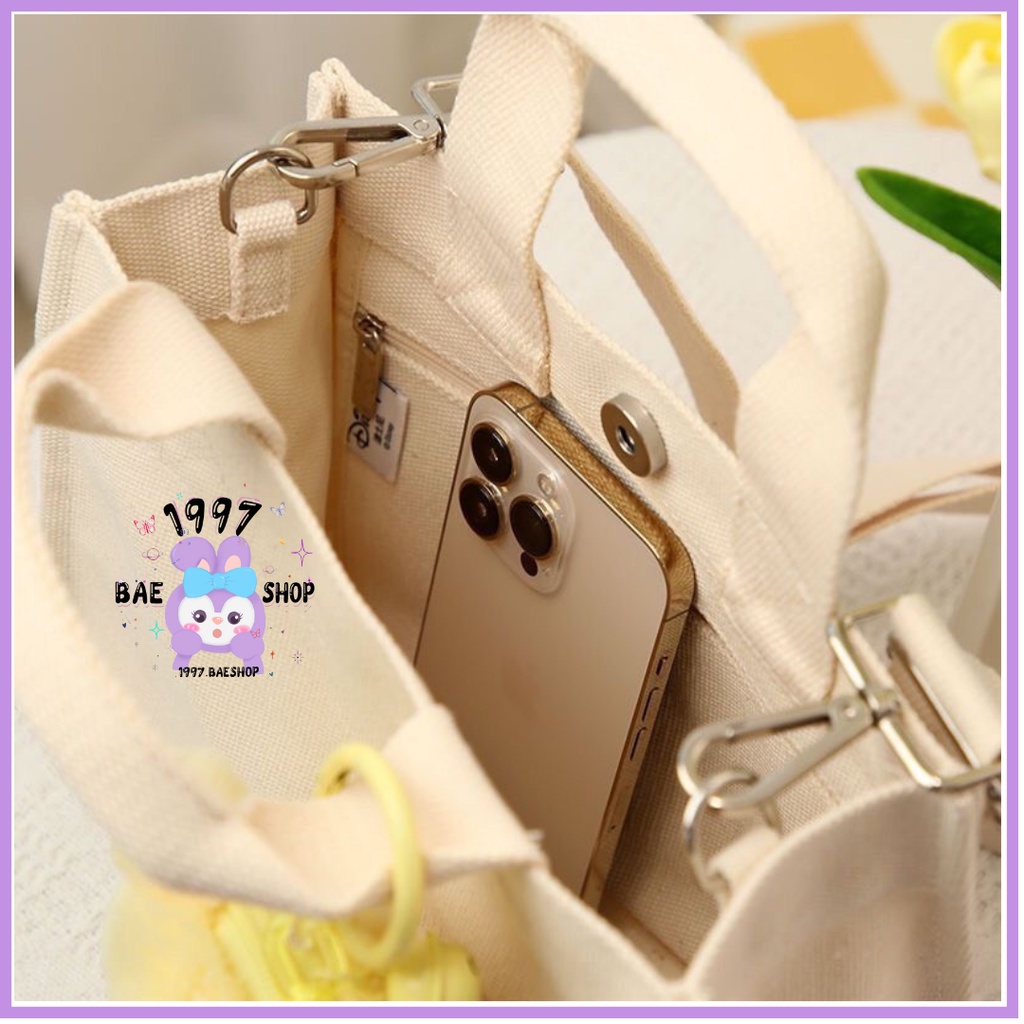 Túi xách vải canvas kèm charm gấu Lotso