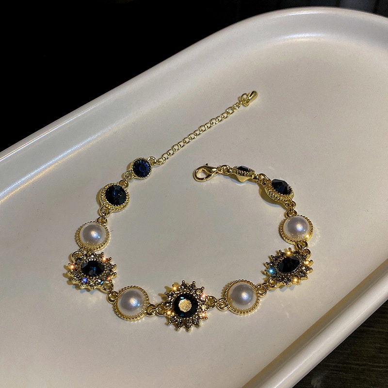 Vòng Tay Ngọc Trai Mặt Hoa Tròn Thời Trang Hàn Quốc