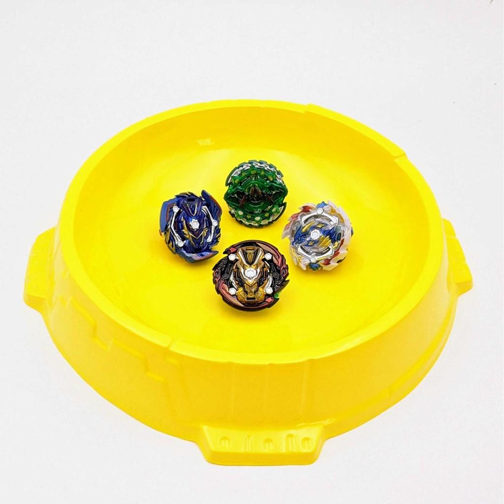 Bộ 4 Con quay BeyBlade + 2 Tay phóng + Sàn đấu - Con quay vòng xoay thần tốc