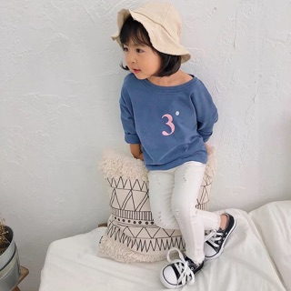 Quần bò rách đen trắng