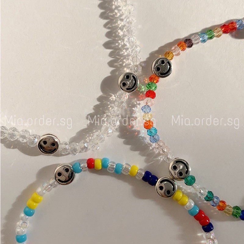 Vòng tay chuỗi hạt pha lê hoặc hạt nhựa HANDMADE nhiều màu sắc có charm mặt cười mạ bạc, mia.order