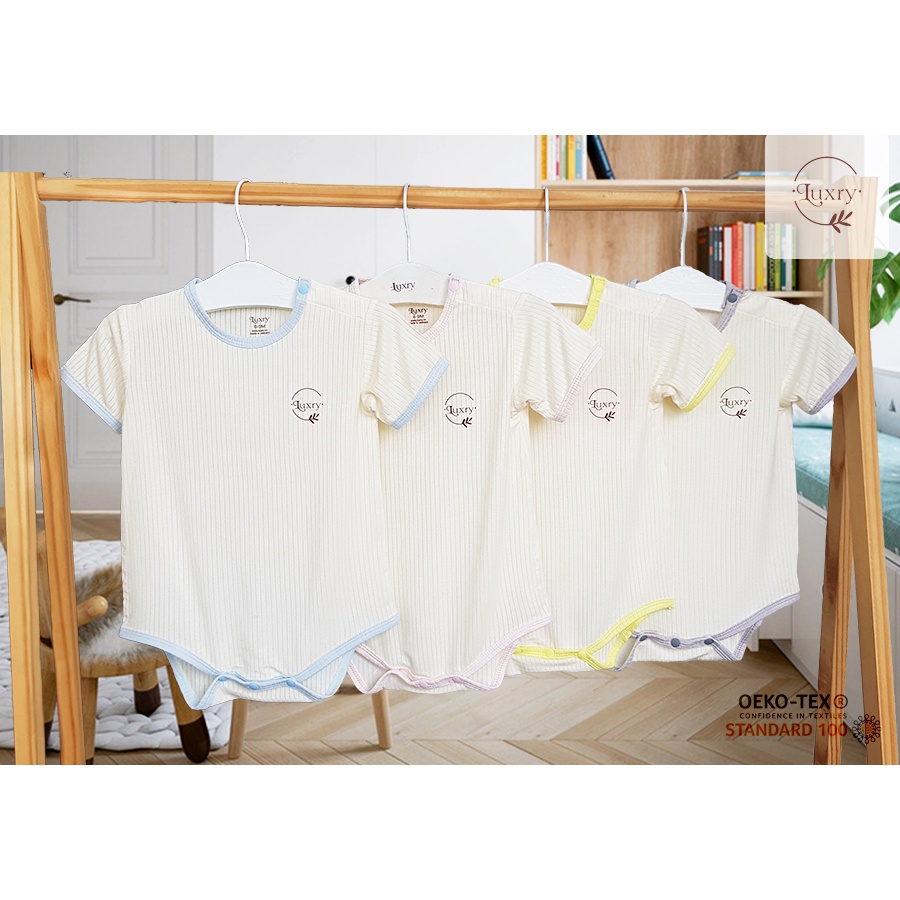 Bộ quần áo liền thân Body chip Luxry nền vàng be phối viền cho bé sơ sinh size từ 0 đến 12 tháng