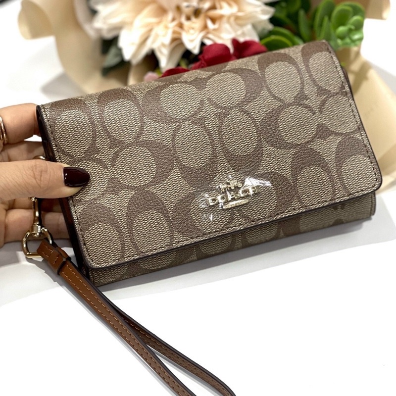 Ví gập Coach size trung da thật pha canvas kèm móc tay tiện dụng