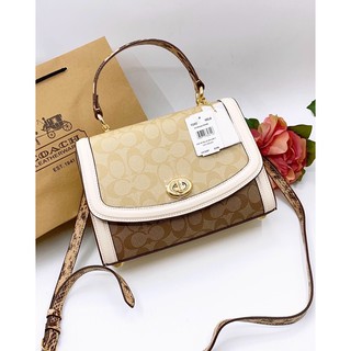 Túi Coach da thật pha canvas viền rắn sang chảnh