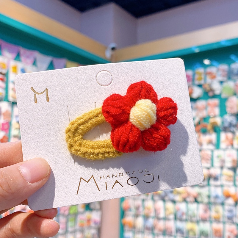 Kẹp tóc đan len hình bông hoa xinh xắn thời trang dễ thương cho bé gái