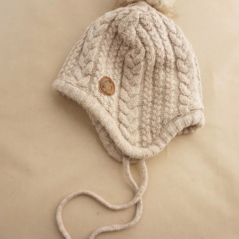 Mũ len quả bông buộc dây cho bé