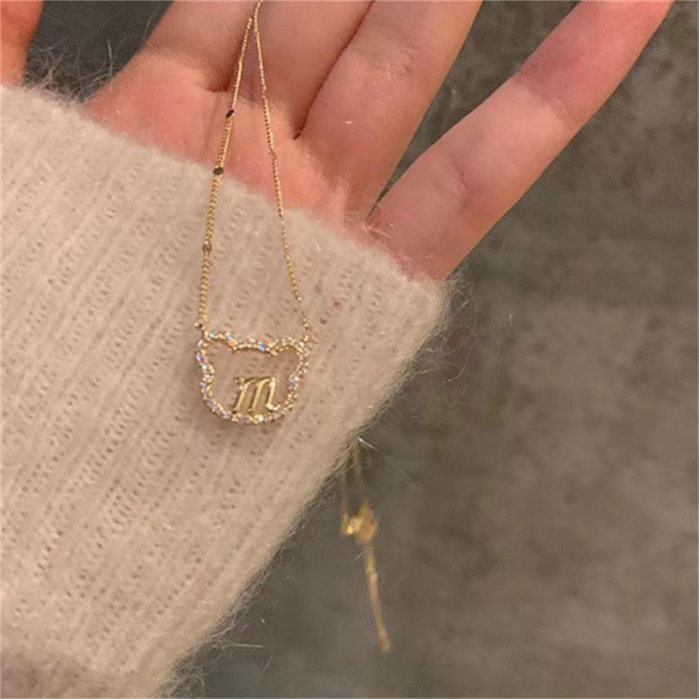 Vòng cổ mặt hình gấu và chữ M
