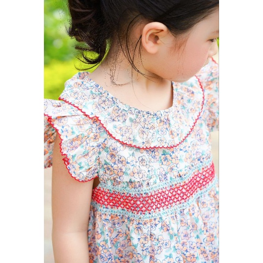 Đầm hoa nhí cổ sen smock