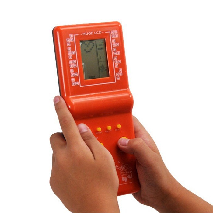 Máy ĐIỆN TỬ XẾP GẠCH HÌNH Cầm Tay Thần Thánh - Trò Chơi Game 4 Nút Tuổi Thơ Trẻ Em - Xe Tăng, Đua Xe, Rắn...