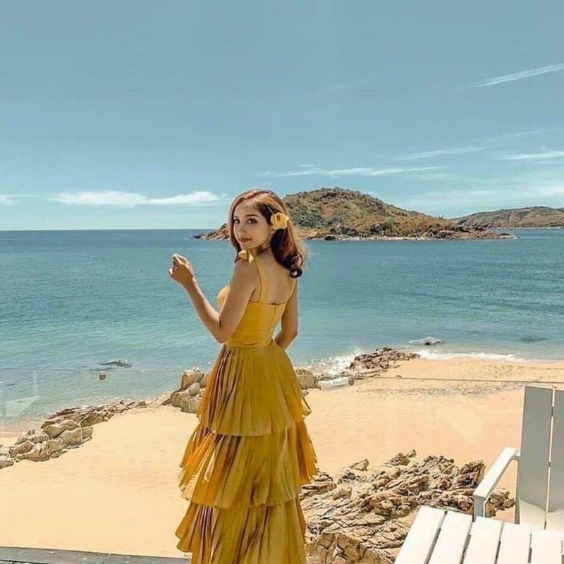 G9  - đầm xoè vàng dập tầng nơ vai