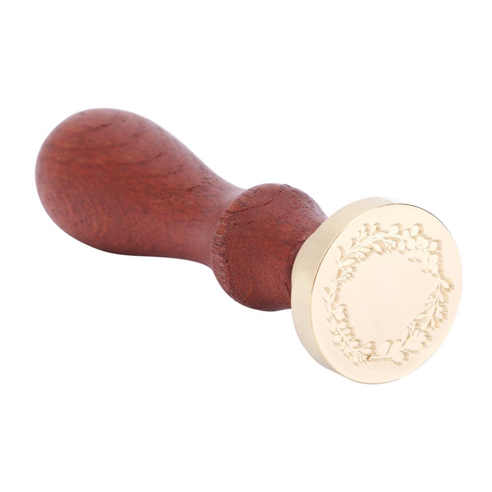 Con dấu đóng mộc niêm phong bằng kim loại và tay cầm bằng gỗ