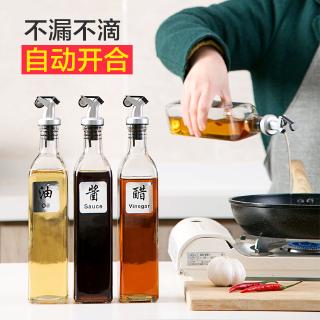 Chai thủy tinh đựng dầu ăn mở tự động chống tràn tiện dụng