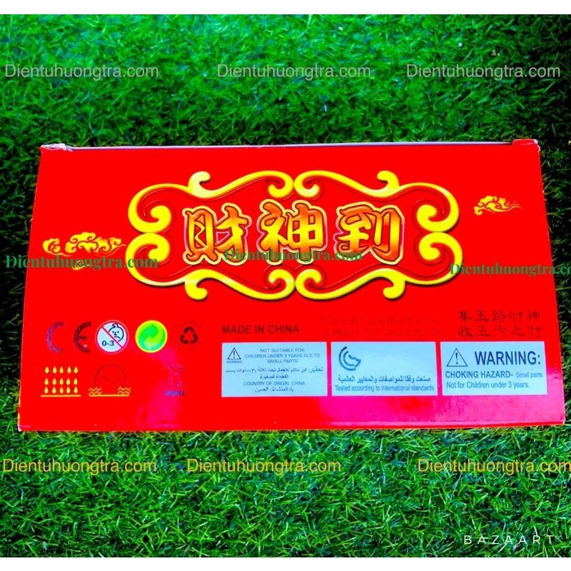 Thần Tài ngồi thỏi vàng gật đầu rứơc may mắn, chào khách vào nhà
