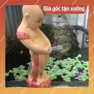 Cậu bé tè trang trí hòn non bộ; tháp nước
