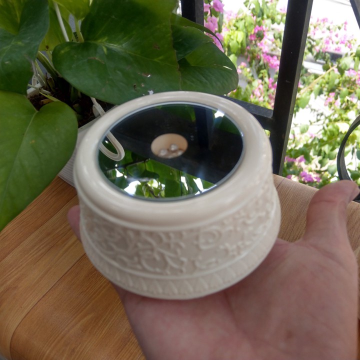 Đế xoay có led dây cót xoay phát nhạc - DX010