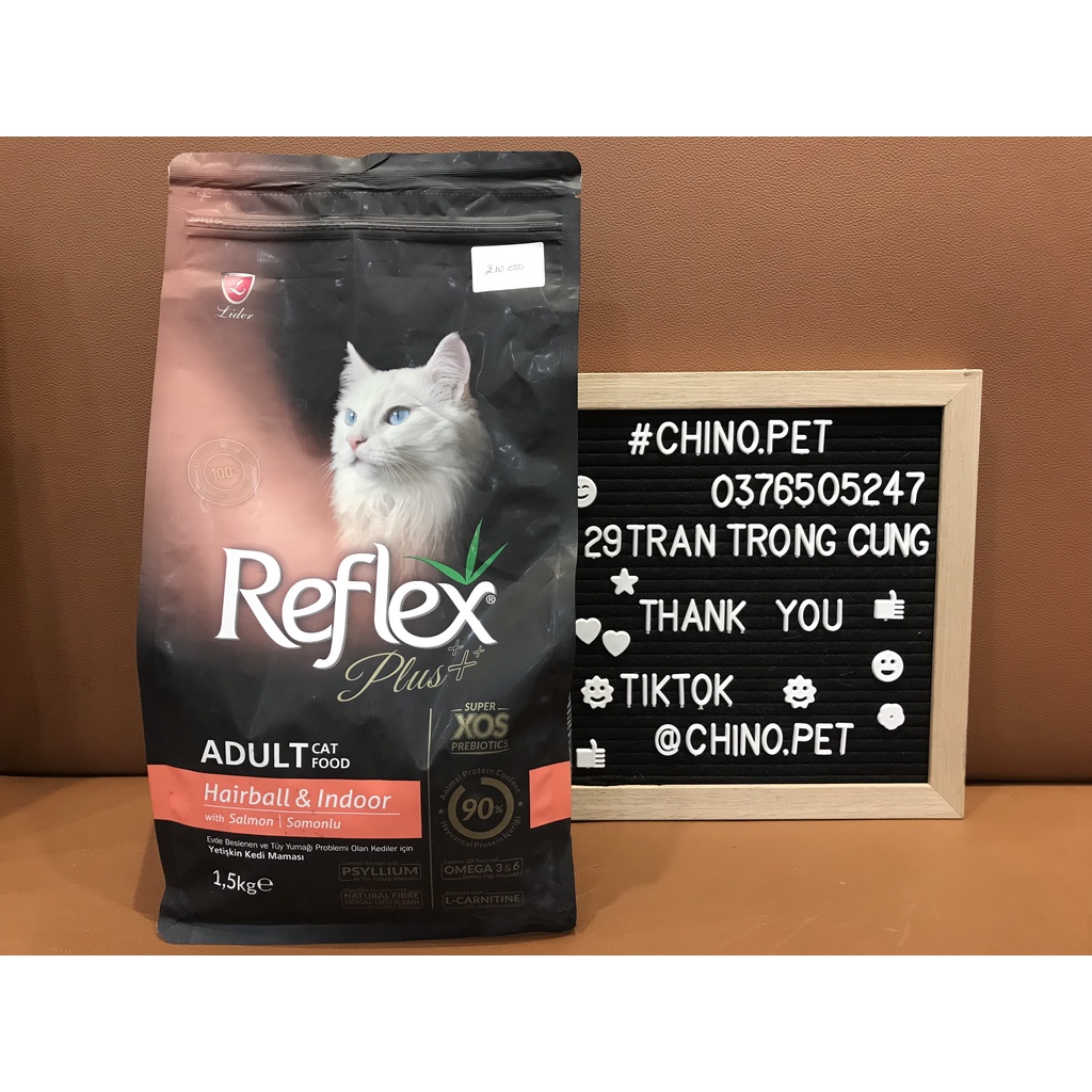 Hạt Reflex Plus Hairbal and Indoor cho mèo lớn thức ăn khô hỗ trợ tiêu búi lông và giảm mùi phân hôi vị cá hồi túi 1.5kg