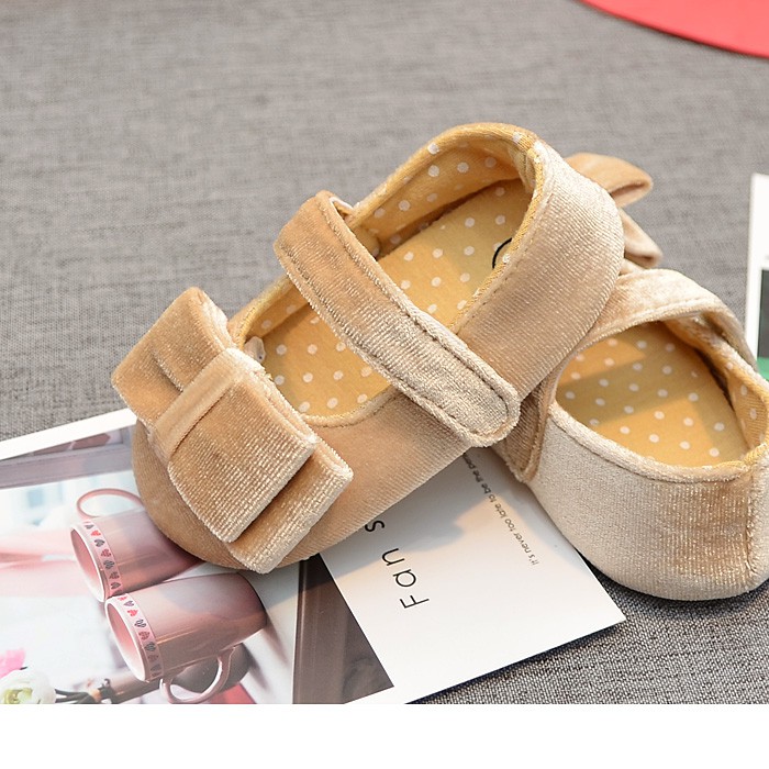 Giày nhung thắt nơ kiểu dáng công chúa dành cho trẻ nhỏ