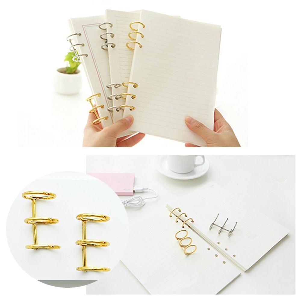 Còng kim loại 3 lỗ giữ bìa lá rời gọn gàng để bàn cho học sinh