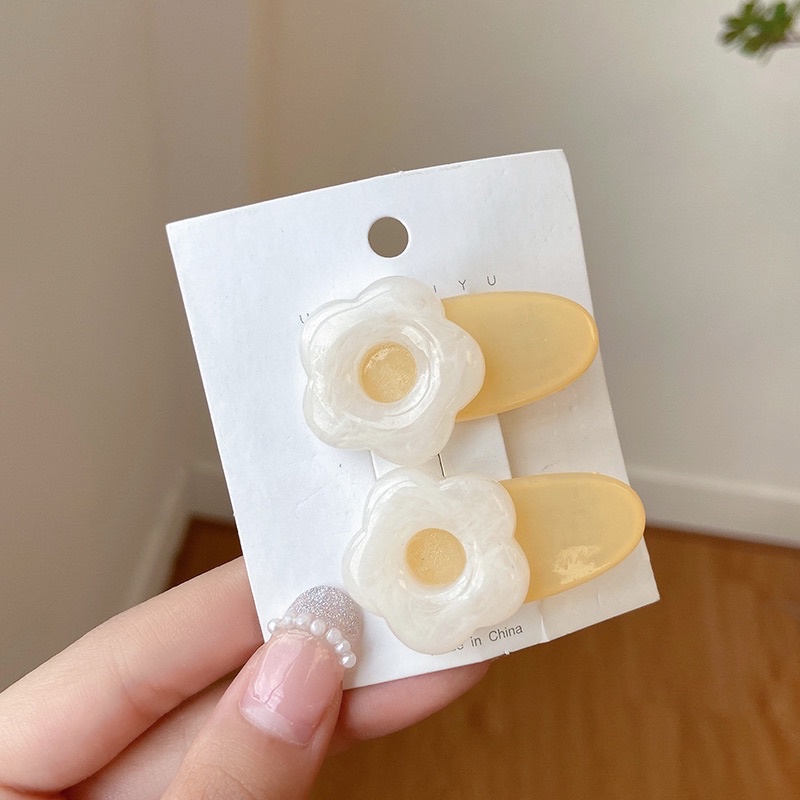 Bím tóc  xinh sắn hình bông hoa cho bé hàng quảng châu