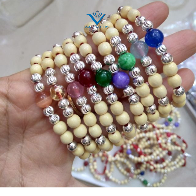 Vòng dâu 9 bi bạc kèm đá mệnh cho bé gái