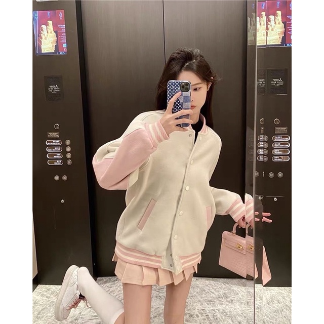Set áo khoác thể thao kèm chân váy xếp ly
