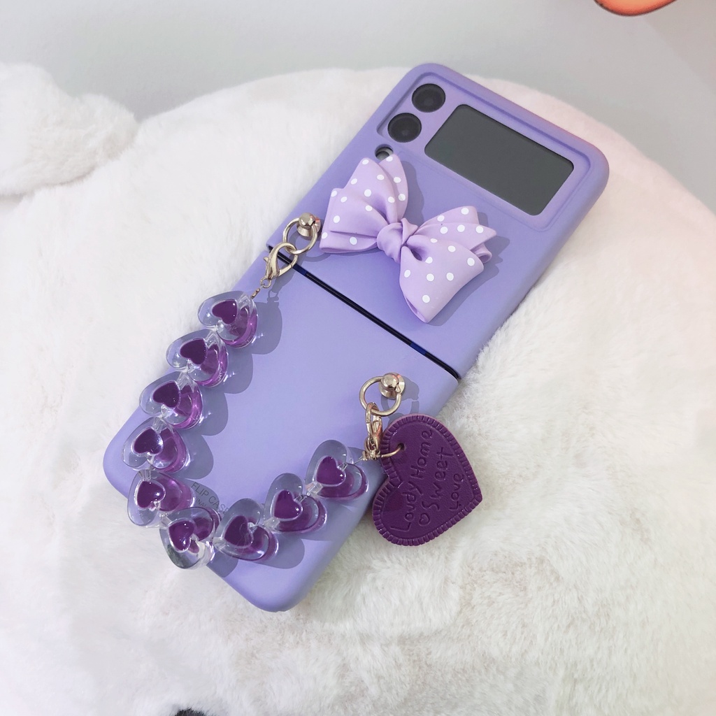 Ốp Samsung Z Flip3 / ZFlip3 / Z Flip4/ ZFlip4 đính nơ có dây xách xinh xắn (2 màu)