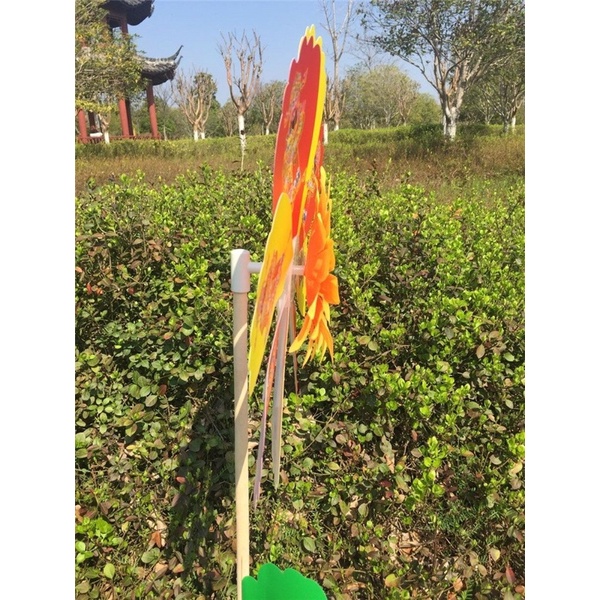 Chong chóng Thần Tài may mắn,  đem lại may mắn cho người bán hàng.