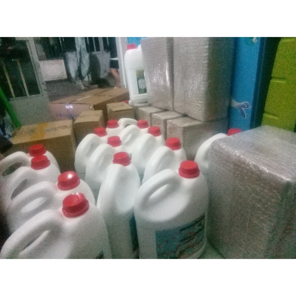 Com bo Nước giặt và Nước xả vải - 2 can 3.8kg.